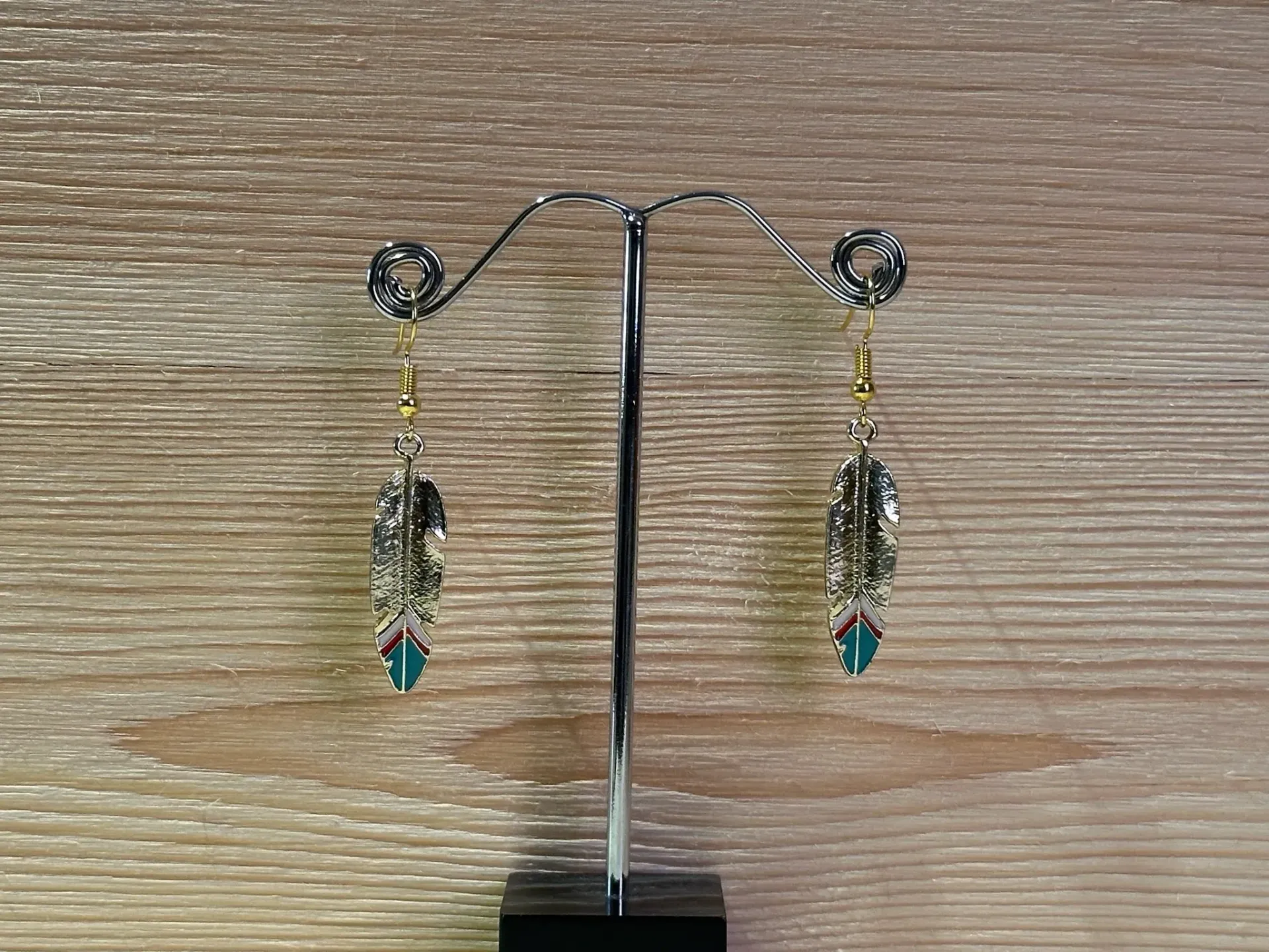 Boucle d'oreilles plume dorée ou argentée en acier inoxydable (Dorée)