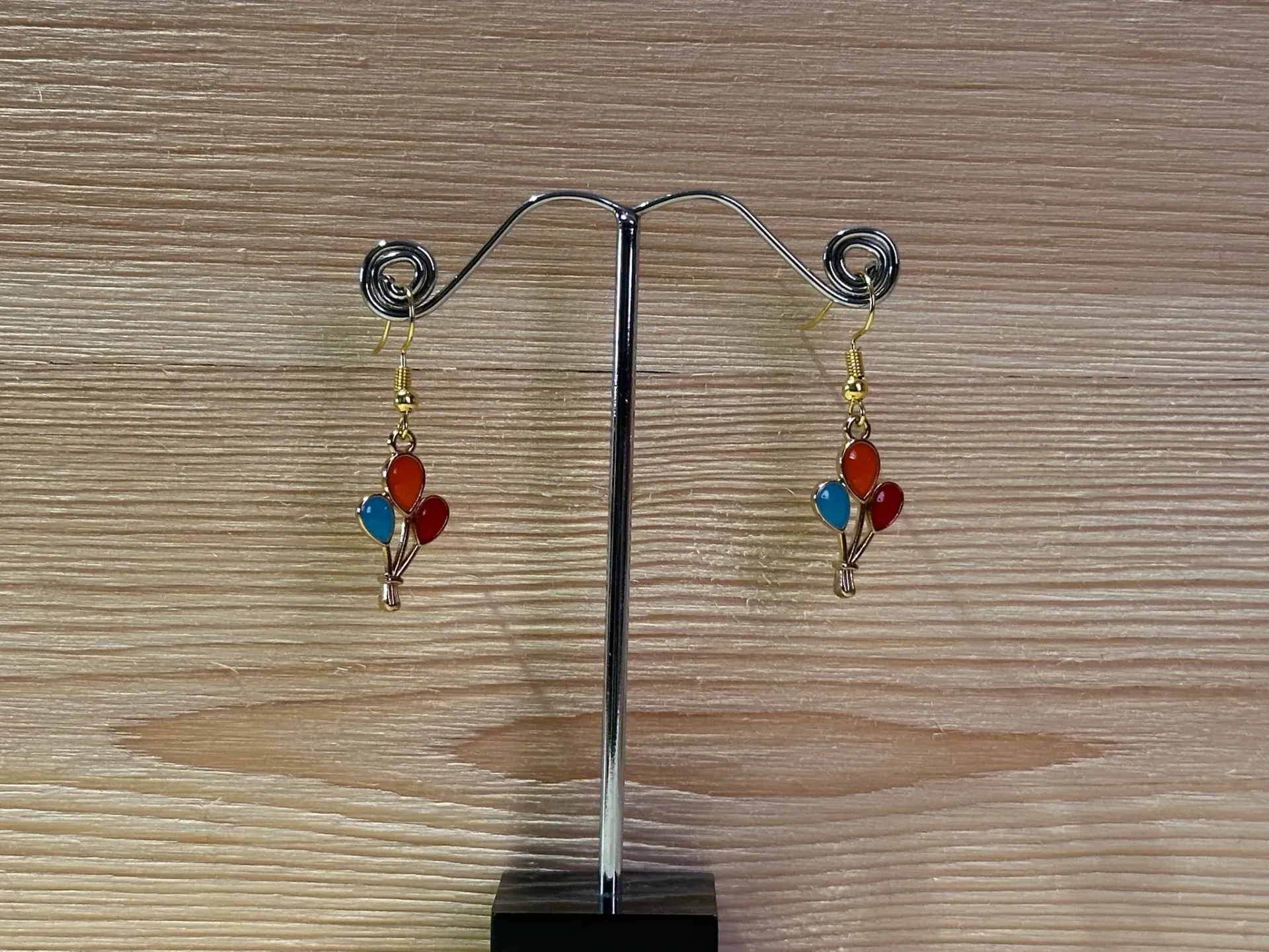 Boucles d'oreilles dorées ballons en acier inoxydable