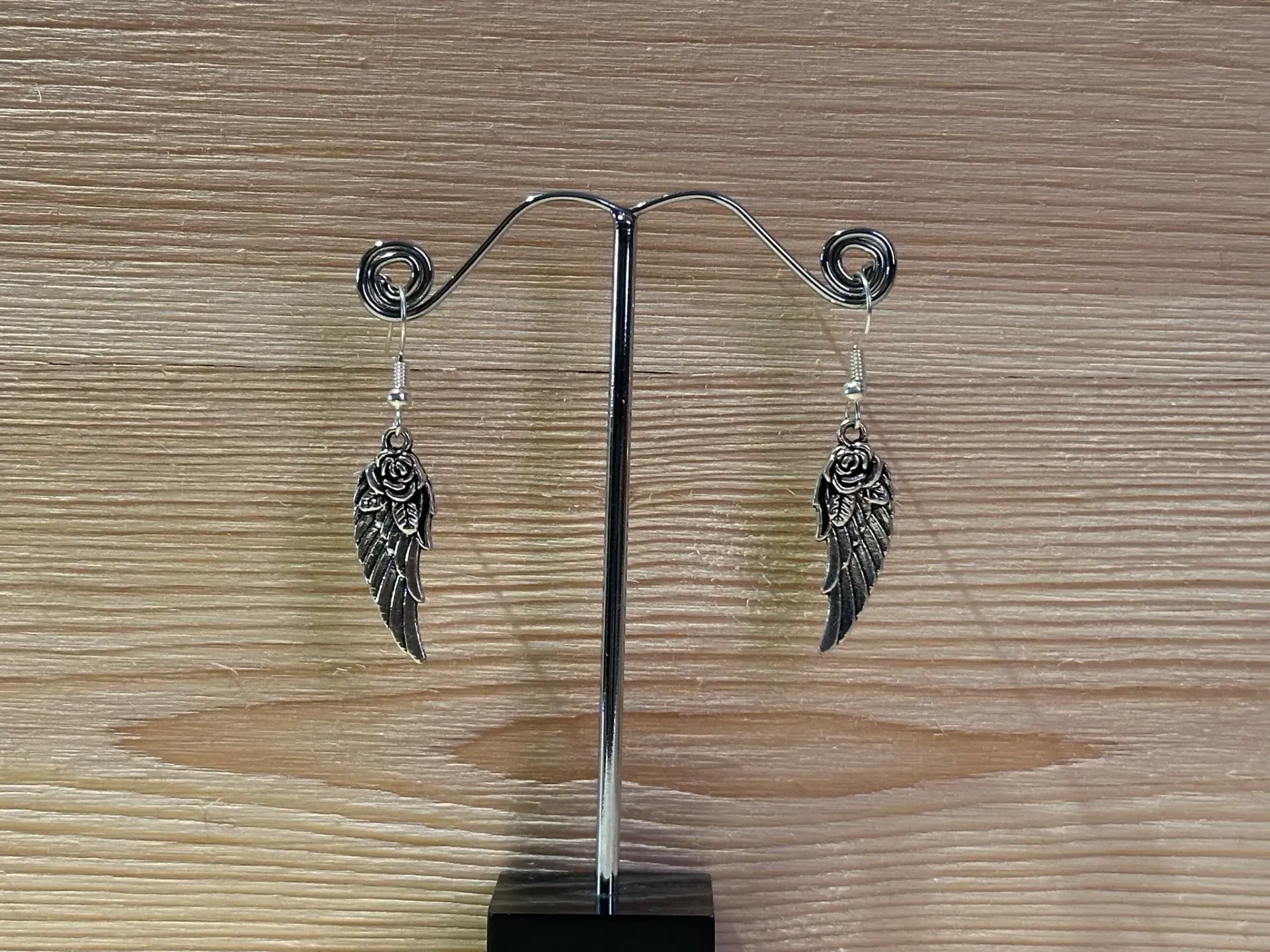Boucles d'oreilles argentée plume en acier inoxydable