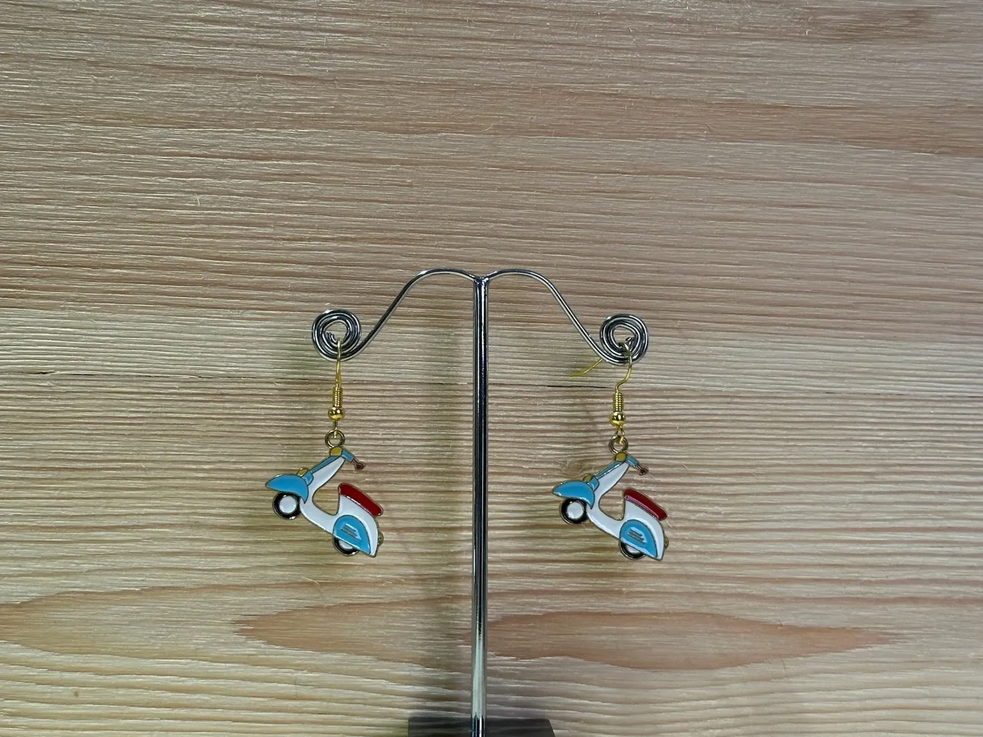 Boucle d'oreilles dorées vespa en acier inoxydable