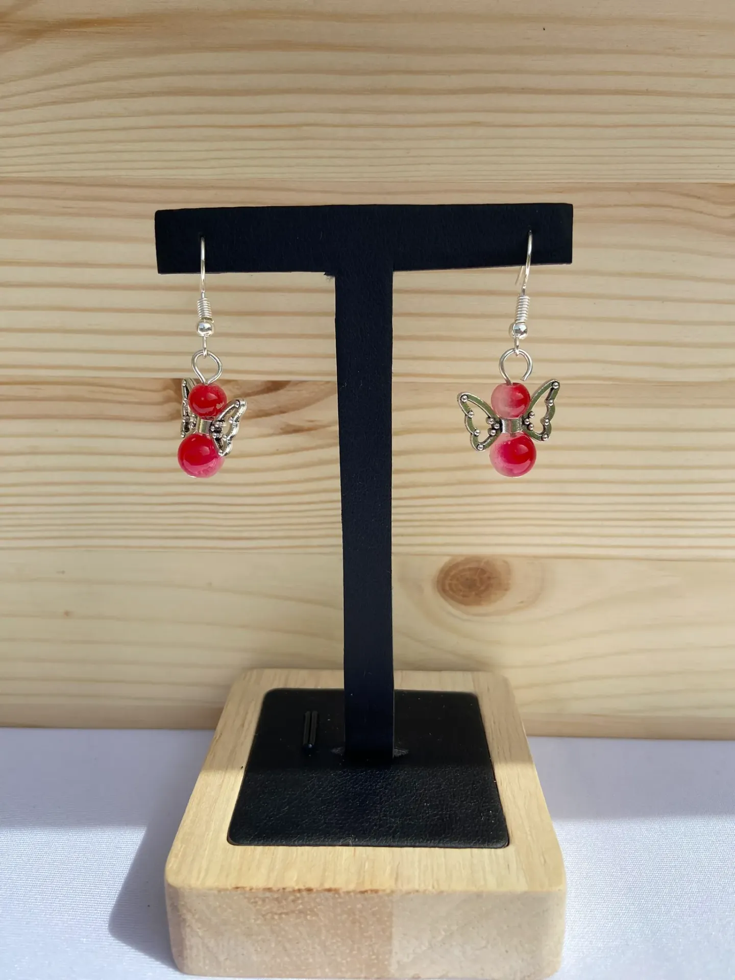 Boucles d'oreilles argentées petits anges couleur au choix en acier inoxydable