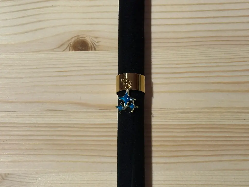 Bague dorée avec étoile bleue en acier inoxydable