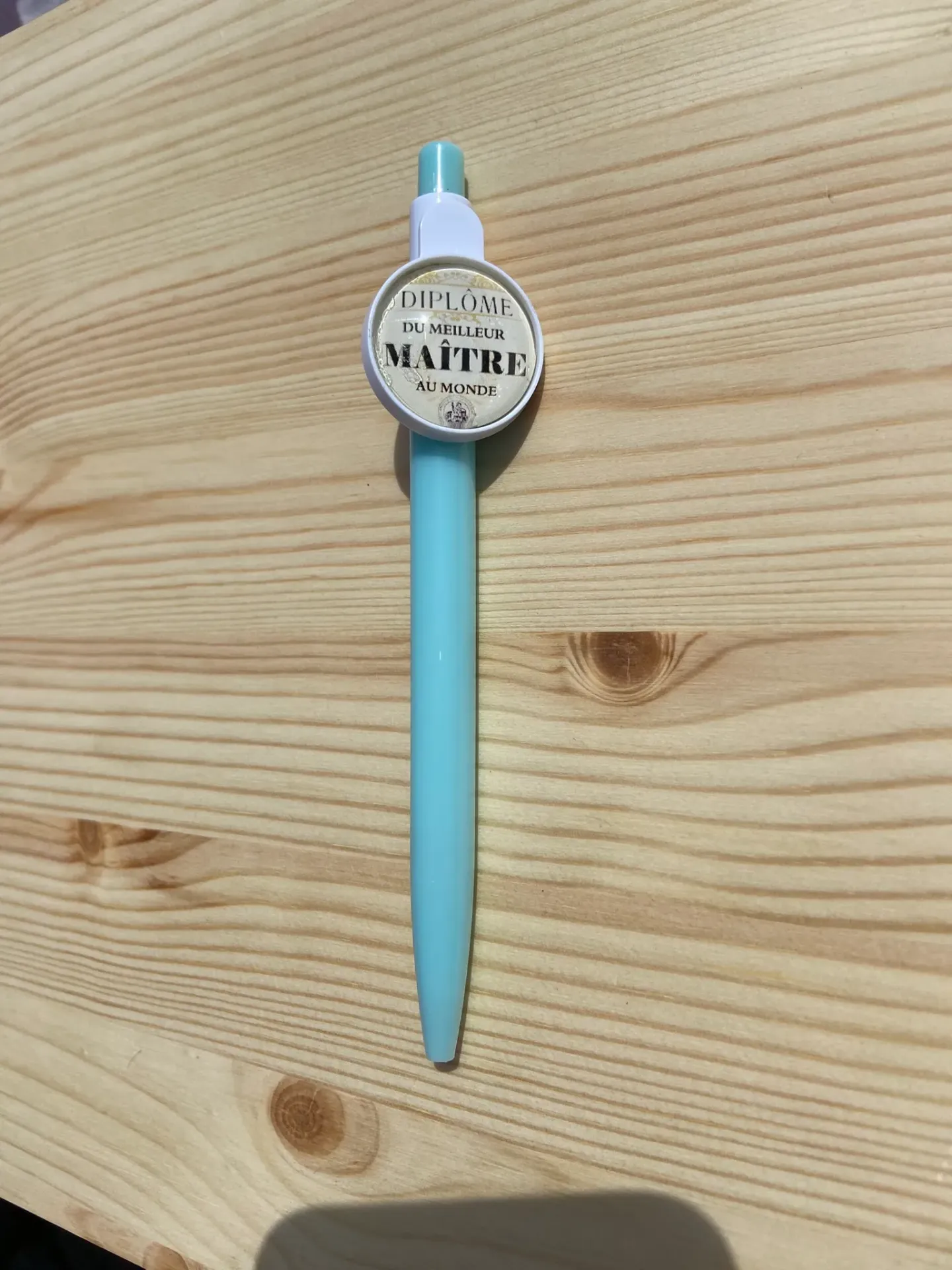Stylo bleu "diplôme du meilleur maitre au monde"