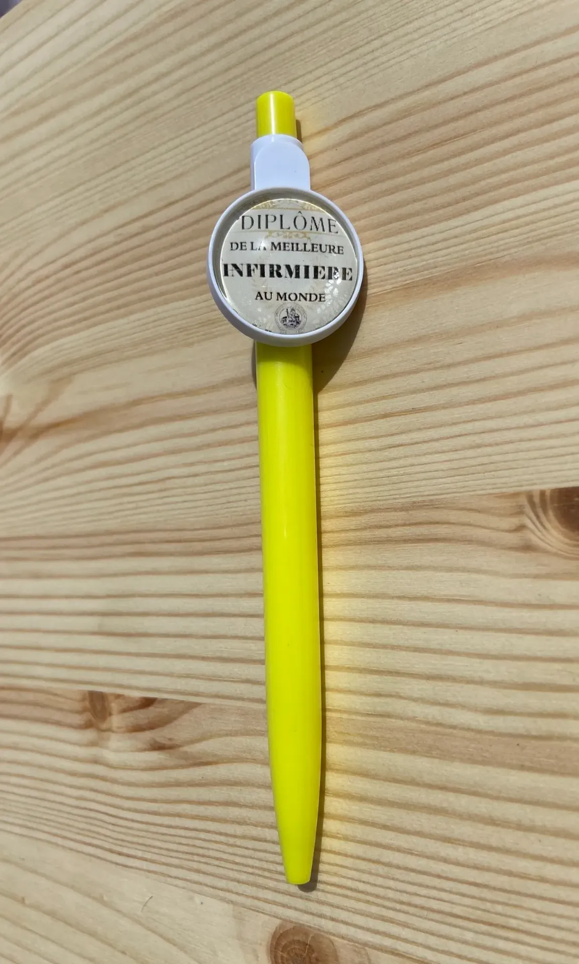 Stylo jaune "diplôme de la meilleure infirmière au monde"