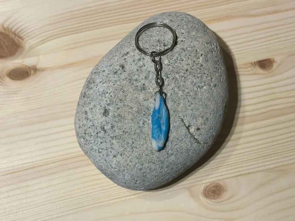 Porte-clé plume bleue et blanche