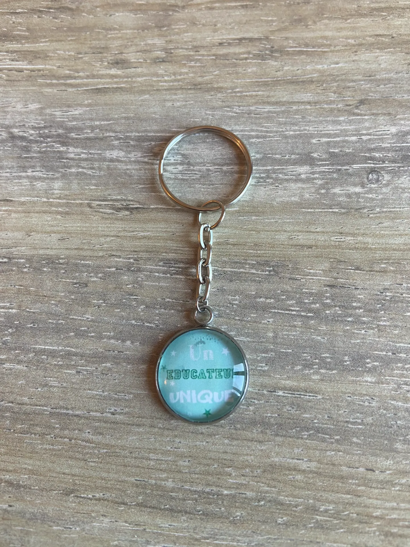 Porte-clé "un éducateur unique"
