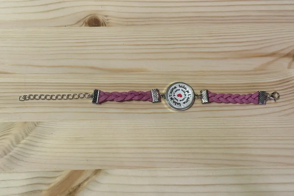 Bracelet tressé en suédine rose avec cabochon en verre "tata je t'aime" taille 12 à 18cm