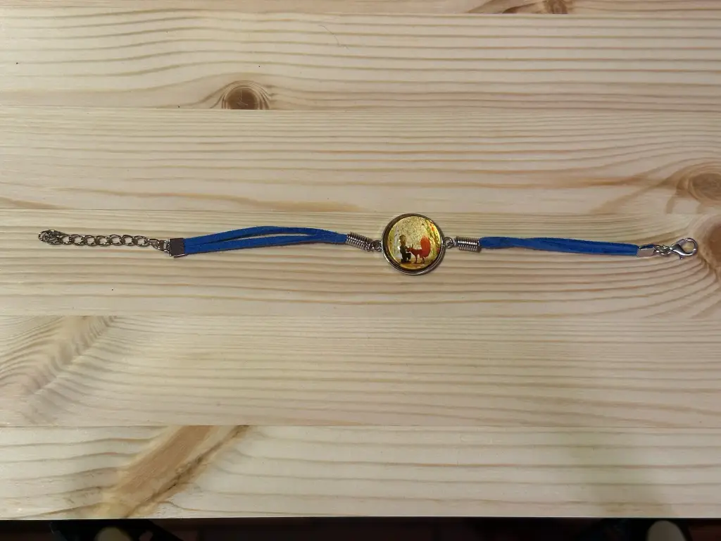 Bracelet en suédine bleue avec cabochon petit prince
