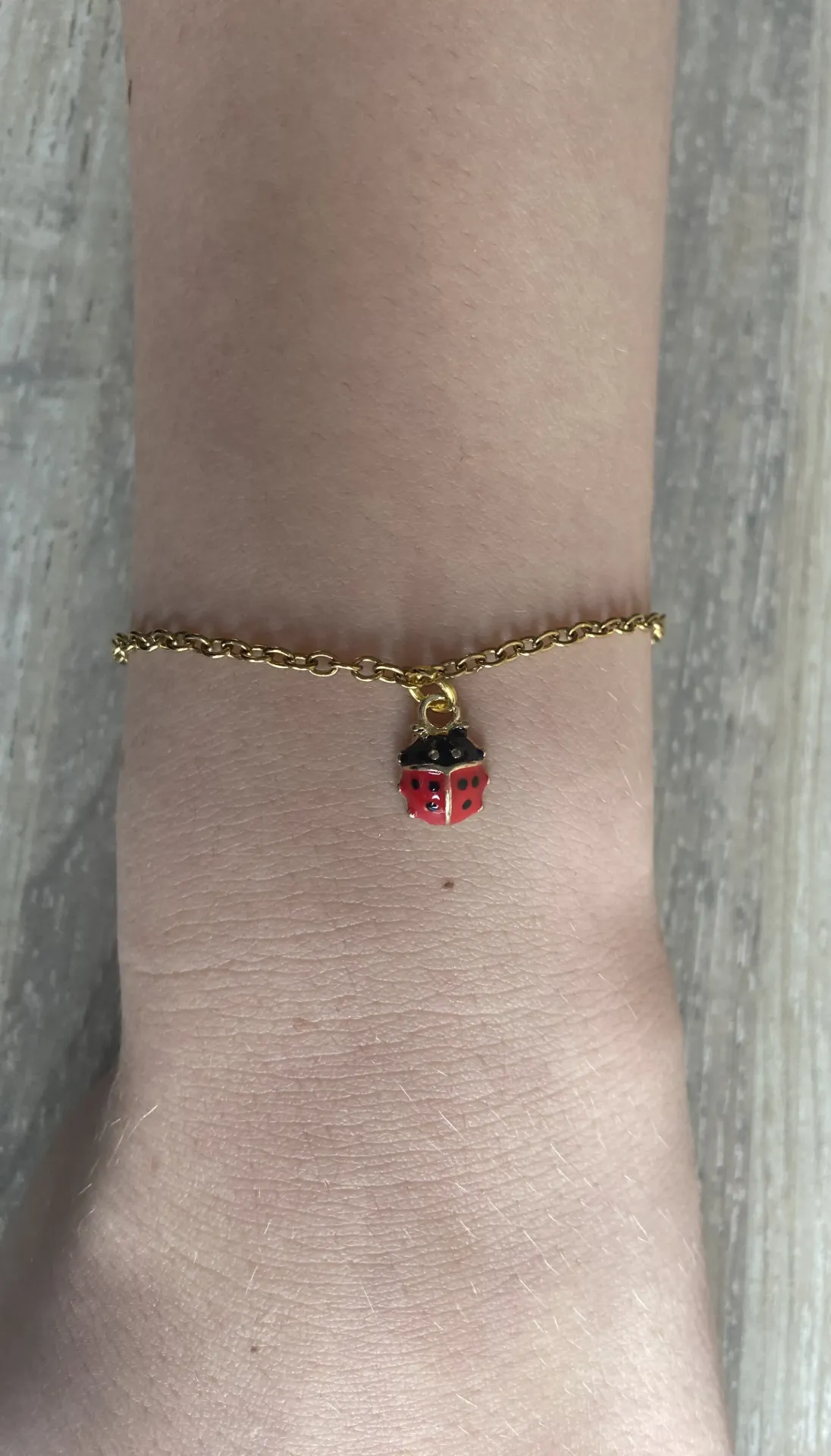 Bracelet doré coccinelle en acier inoxydable
