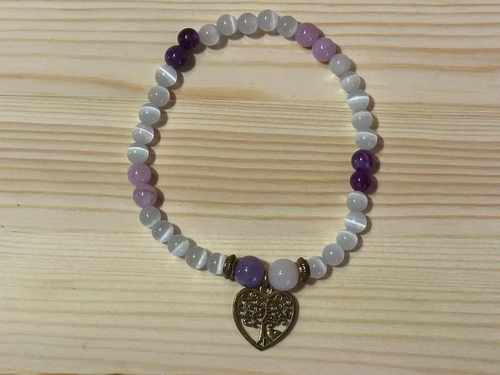 Bracelet en perles roses, blanches, violettes avec breloques arbre de vie 18cm