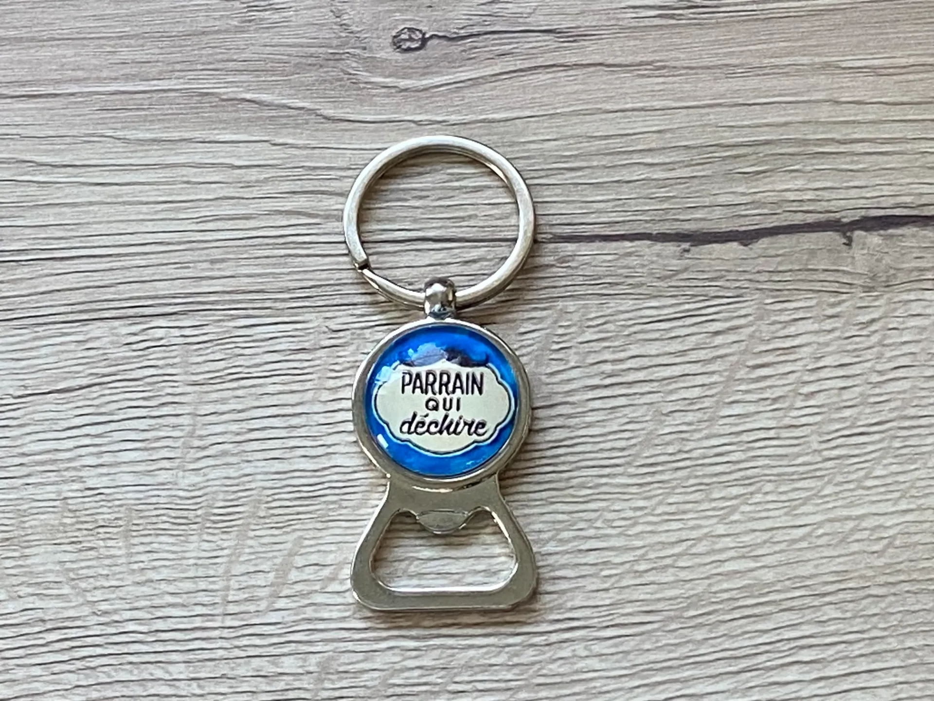 Porte-clé décapsuleur parrain qui déchire