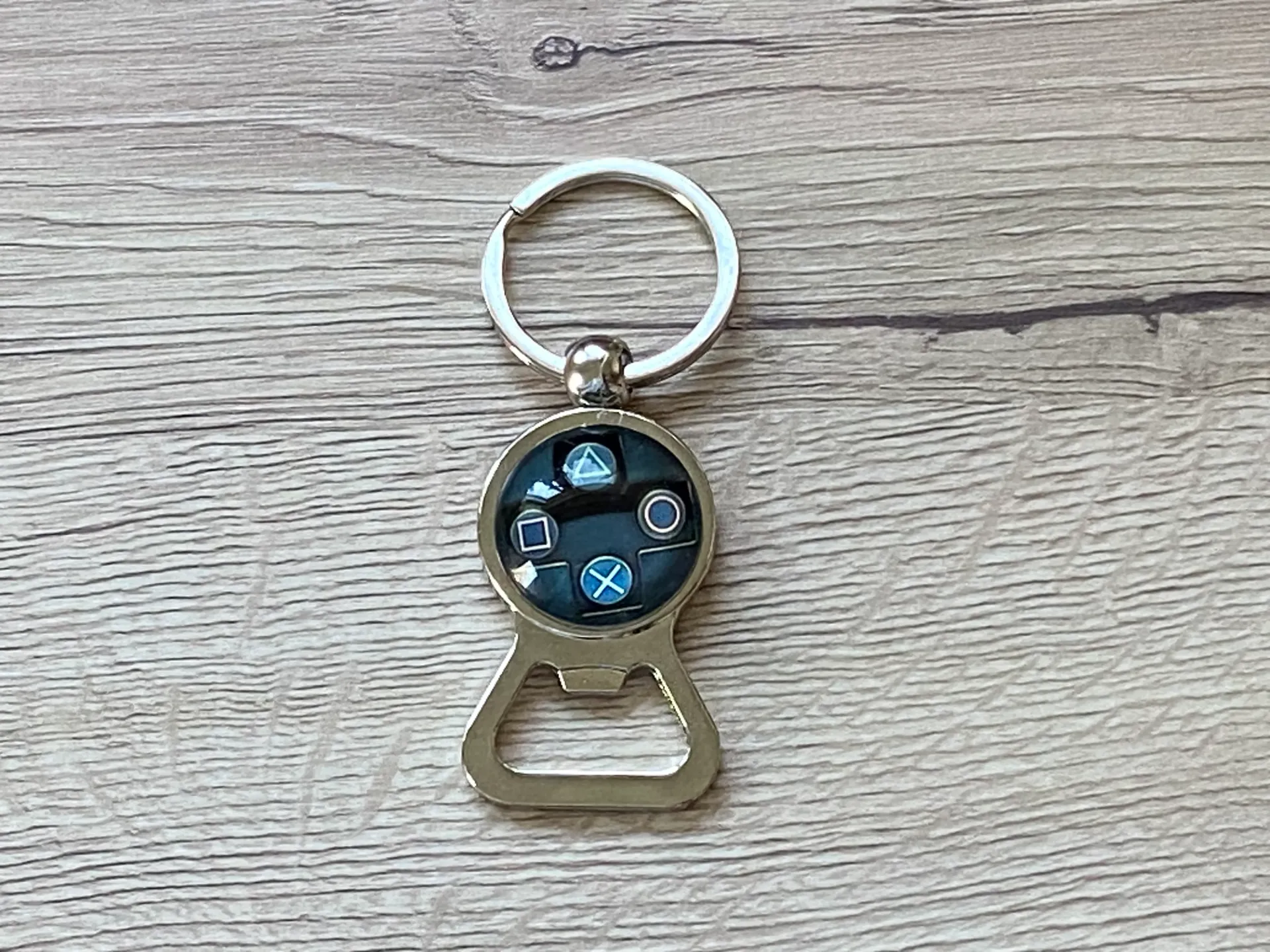 Porte clé décapsuleur manette de jeux