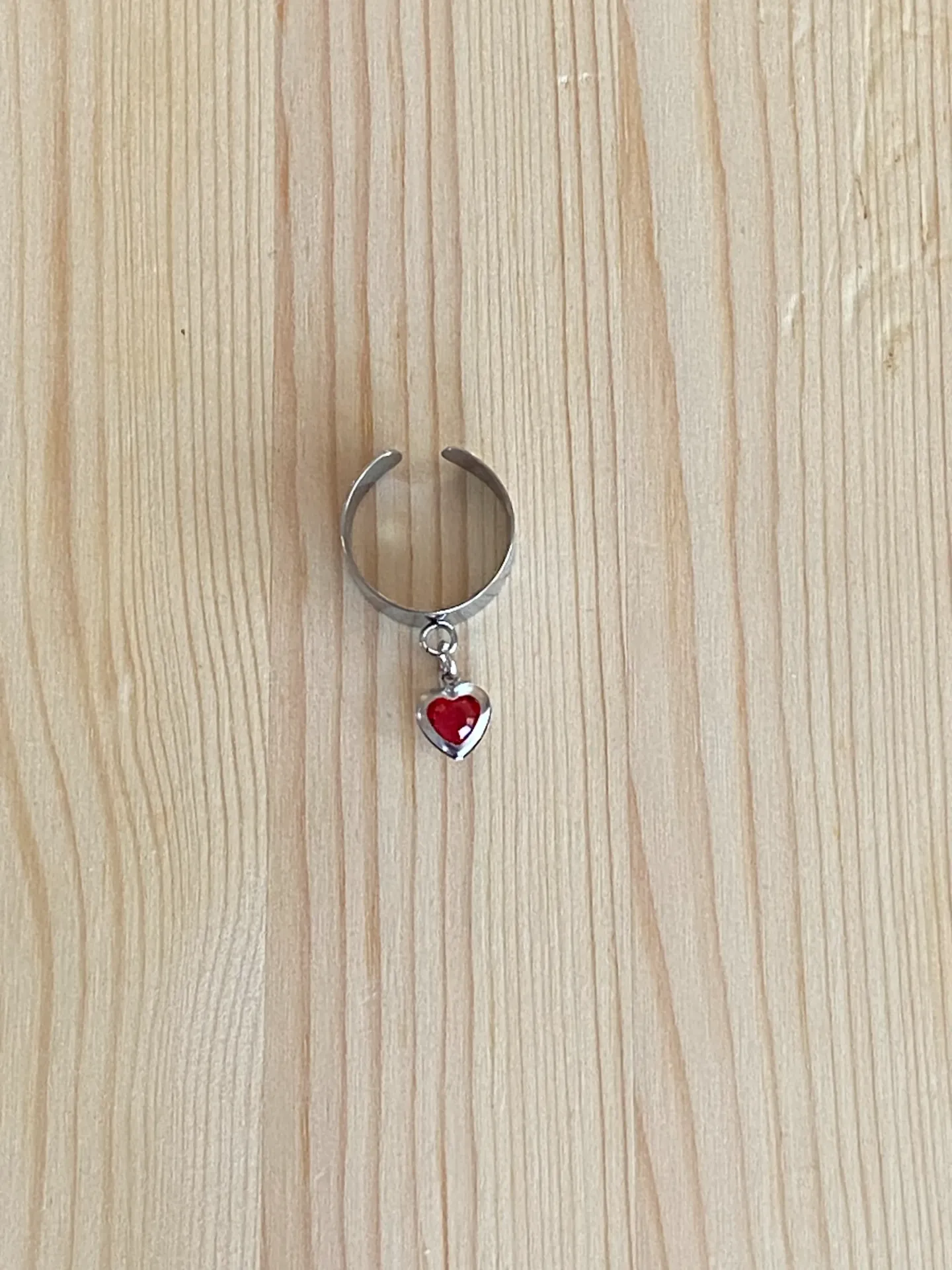 Bague argentée réglable strass rouge en acier inoxydable