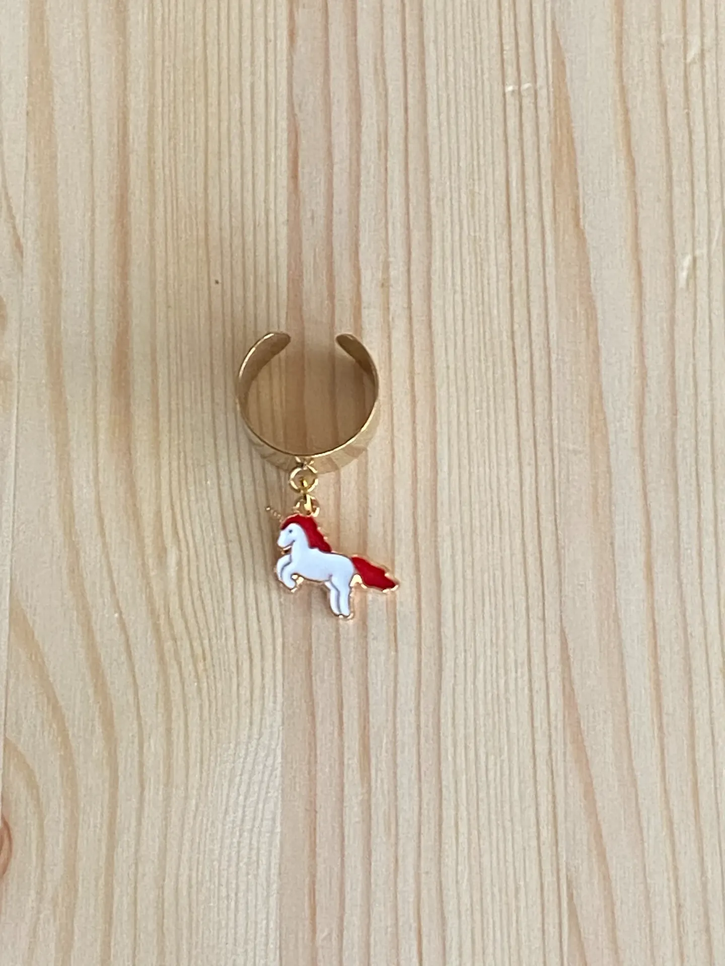 Bague dorée réglable licorne rouge en acier inoxydable